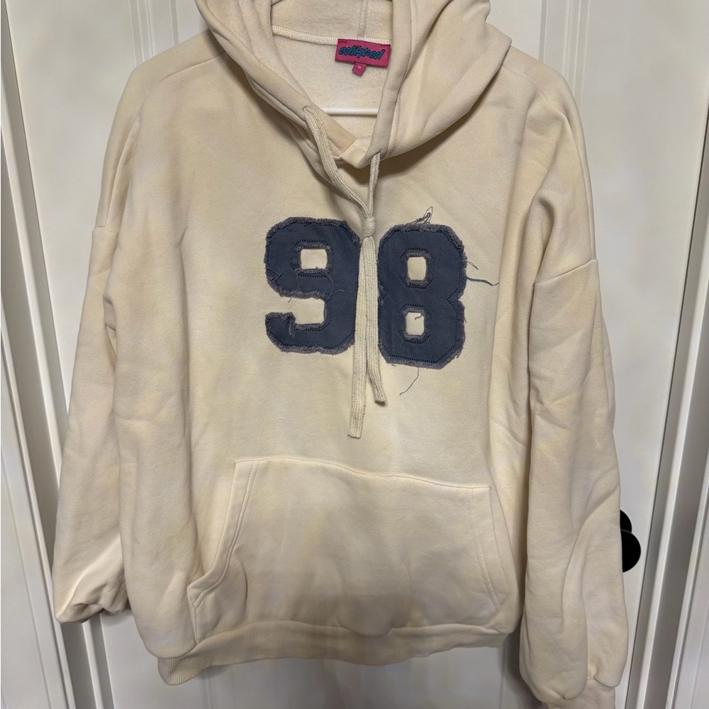 Edikted Cream Hoodie with Blue '98' Patch